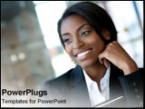 PowerPoint Template - African-American business woman smiles into the distance.