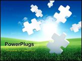 PowerPoint Template - Business Solutions. Conceptual image with falling puzzle pieces in a green field.