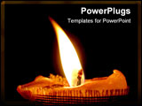 PowerPoint Template - Photo of the isolated glowing candle. Black background.