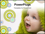 PowerPoint Template - a beautiful smiling baby wrapped in a furry green blanket