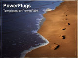 PowerPoint Template - footprints left in the sand of an irish beach with the tide coming in