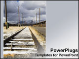 PowerPoint Template - Railroad tracks disappear in the distance.