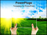 PowerPoint Template - Hand holding photo of field of green grass on background with sunrise