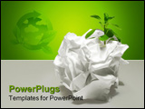 PowerPoint Template - A plant growing from a piece of waste paper showing the importance of recycling.