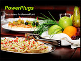 PowerPoint Template - anquet table. Tartlets salads and fruit basket with apple orange pear grapes and juice on a backgro