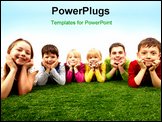 PowerPoint Template - Image of happy boys and girls lying on a green grass