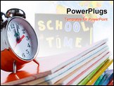 PowerPoint Template - Stack of copybooks with alarm clock on its top